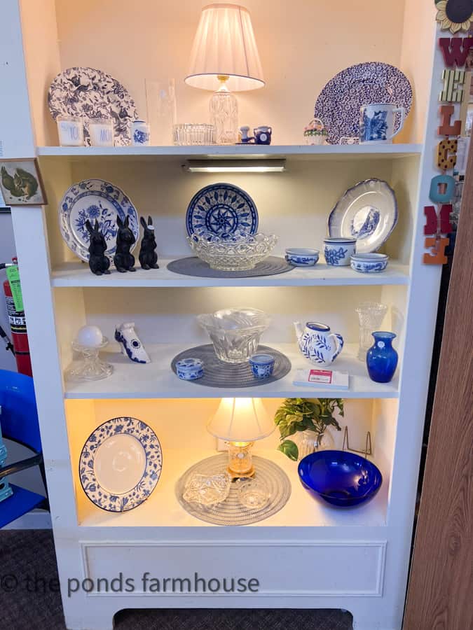 Cabinet full of blue and white dishes at Dosher Flea Market.