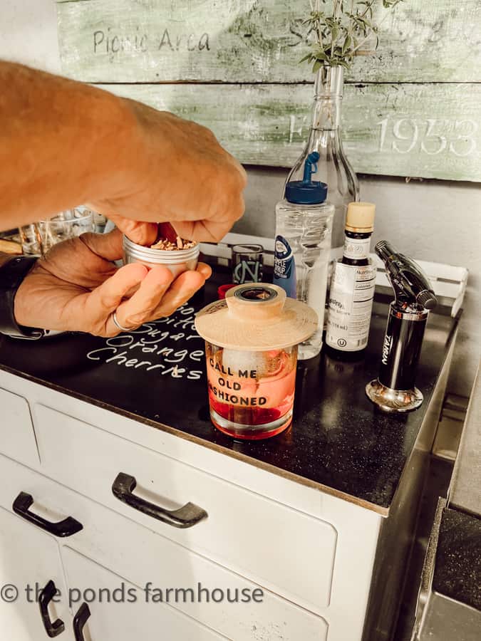 Add wood chips to for a smoked old fashioned bourbon. 