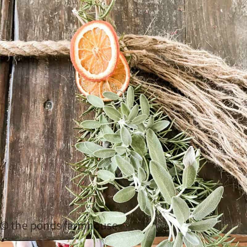 use rosemary and sage to make holiday fresh herb and dried fruit garland.