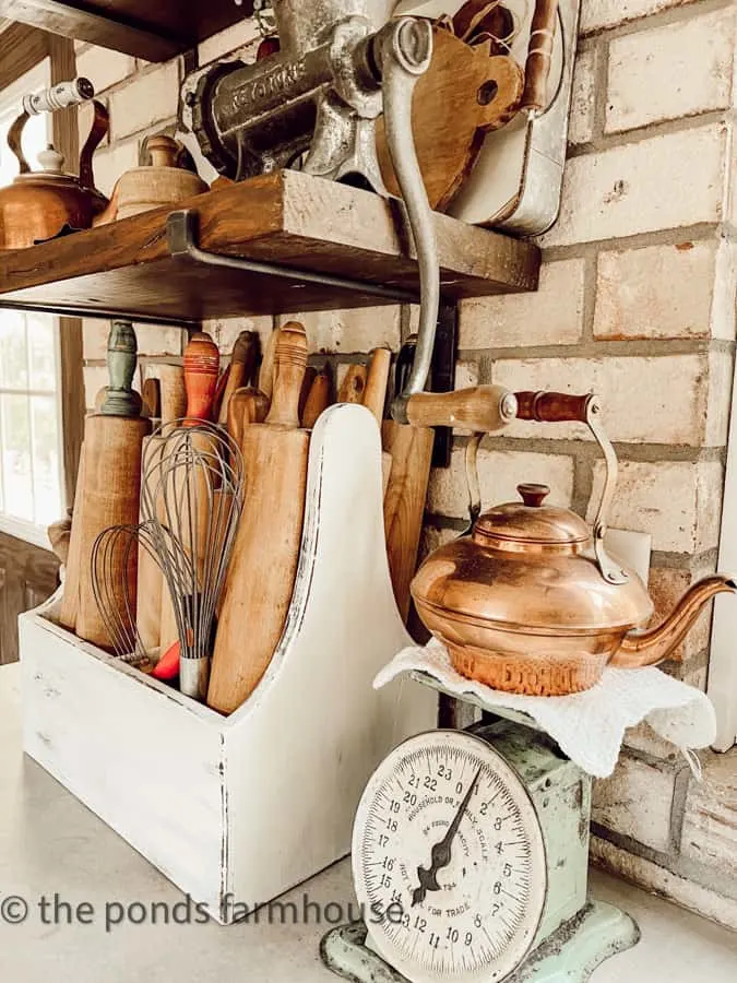 Vintage Scale for decorating a modern farmhouse kitchen with vintage decor beside vintage rolling pins.