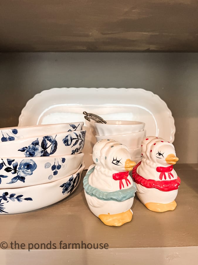 Vintage chicken salt and pepper shakers in red white and blue.