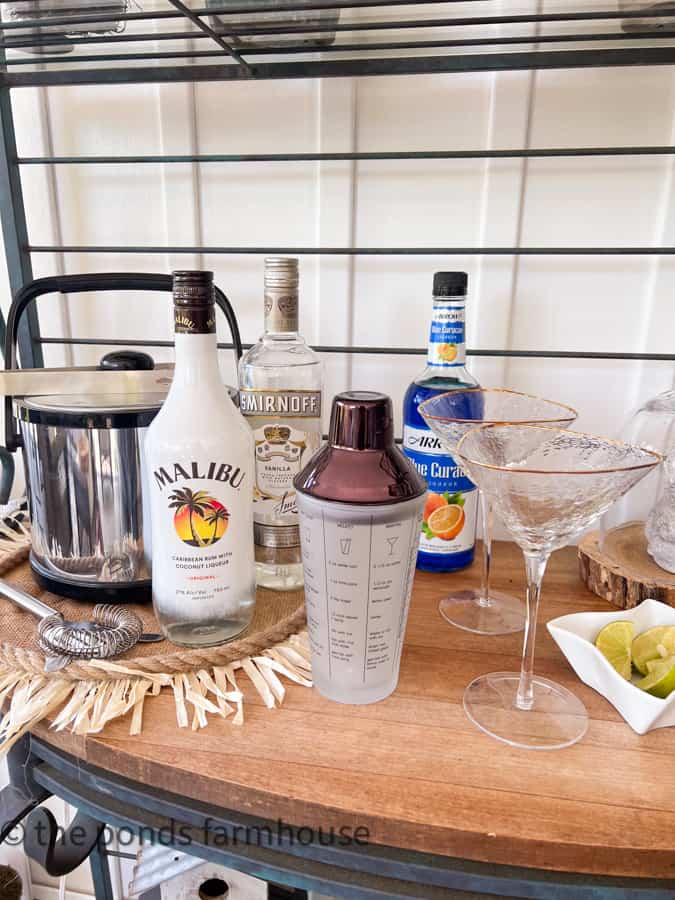Bar set up for Pina Colada Martini Recipe with gold rimed martini glasses