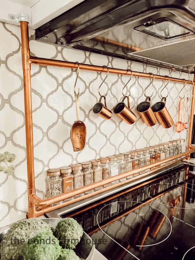 DIY Copper Spice Rack behind kitchen stove on Farmhouse Style Kitchen Counertops