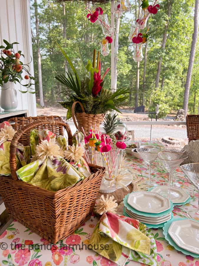 Tropical Themed Cocktail Party Tablescape with DIY Napkin Rings and tropical straws. 