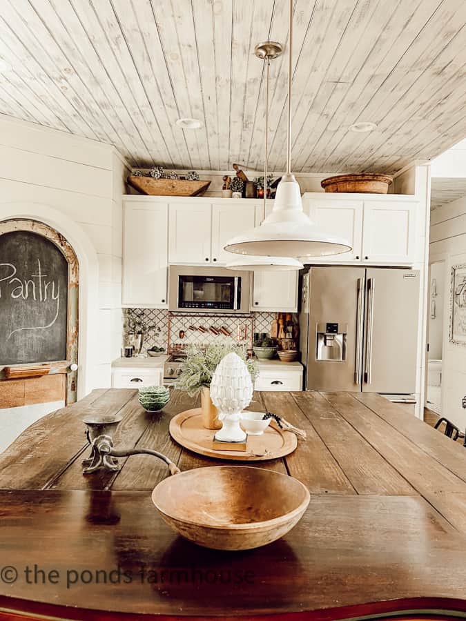 Kitchen Countertops decorated with budget Thrifted Decor.  Farmhouse kitchen island with DIY reclaimed wood top.