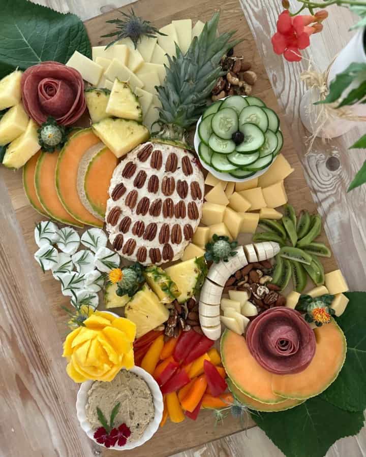 A tropical grazing board appetizers tray is perfect for a tropical party
