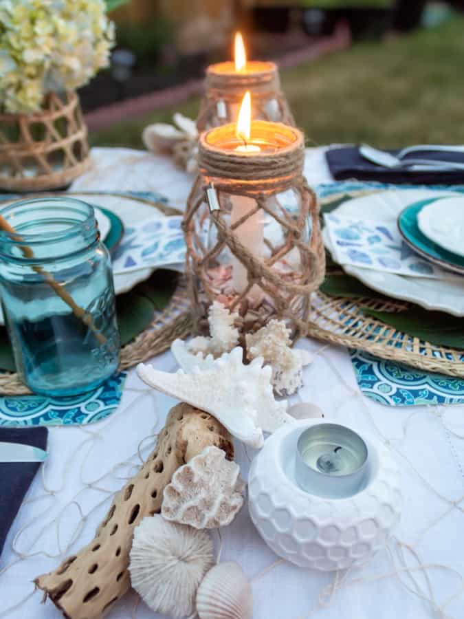 Tropical Cocktail party with sea shells and blue tableware.  