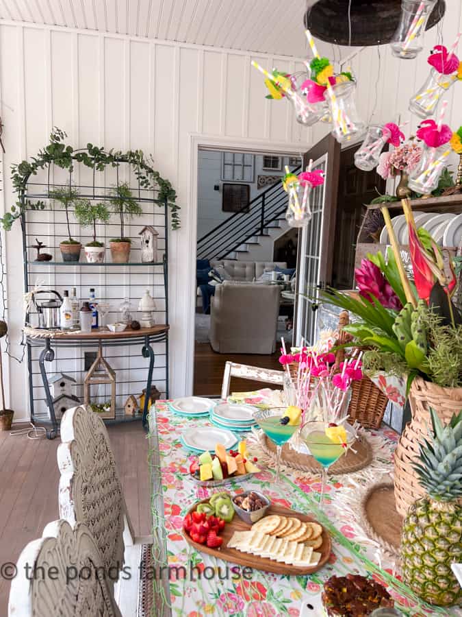 Hawaiian themed party for adults with refreshing pina colada martinis and a charcuterie board.  