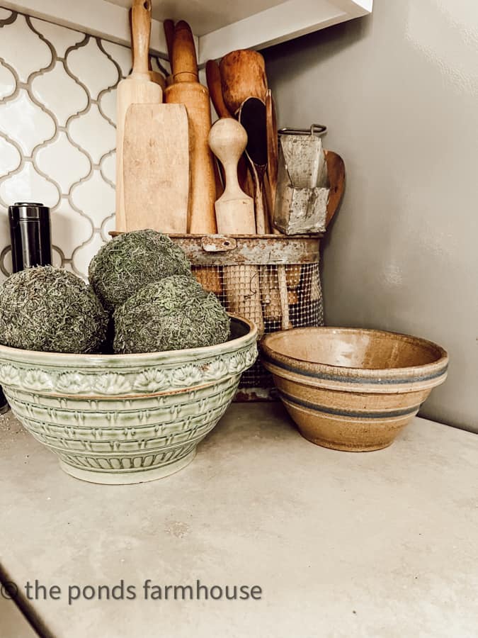 Old Kitchen Bowls and other antique kitchenware on countertop for Decorating Curated Style