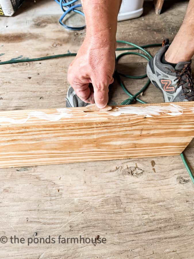 Biscuit being inserted into cut grove for side panel.