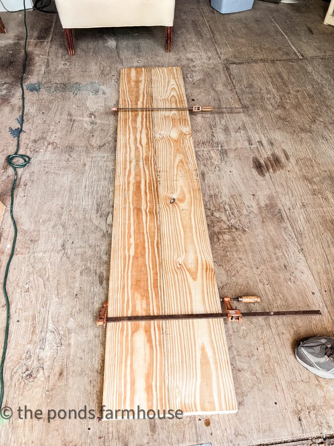 use bar clamps to hold the boards together until glue dries.