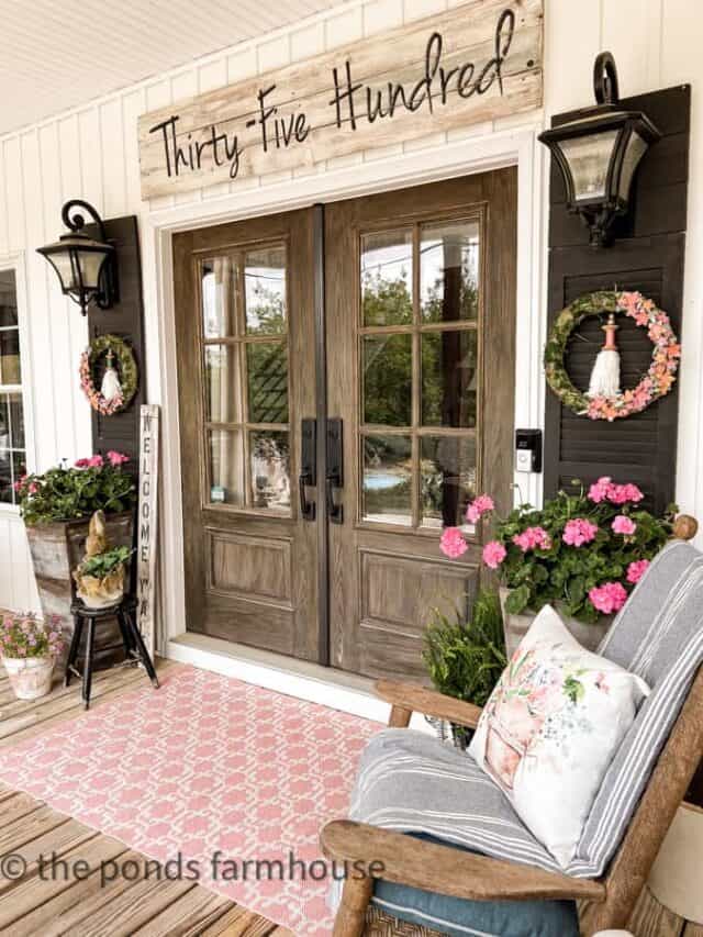 cropped-Country-Porch-French-front-doors-with-pink-rug-and-address-sign.jpg