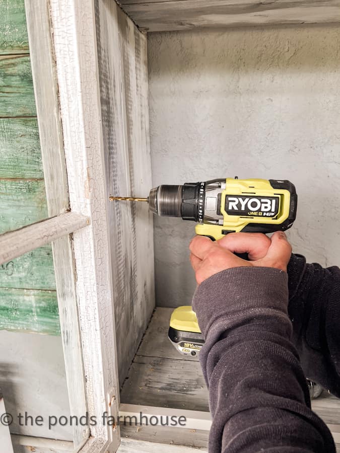 Ryobi drill used to drill hole for shelf clips.