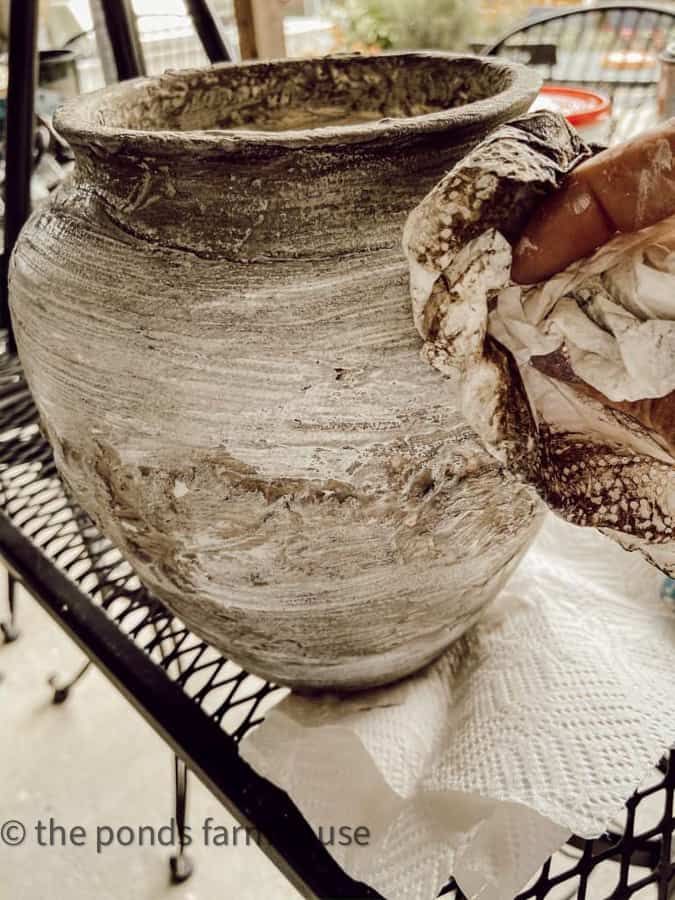 Finishing coloring used to finish faux pottery vase.