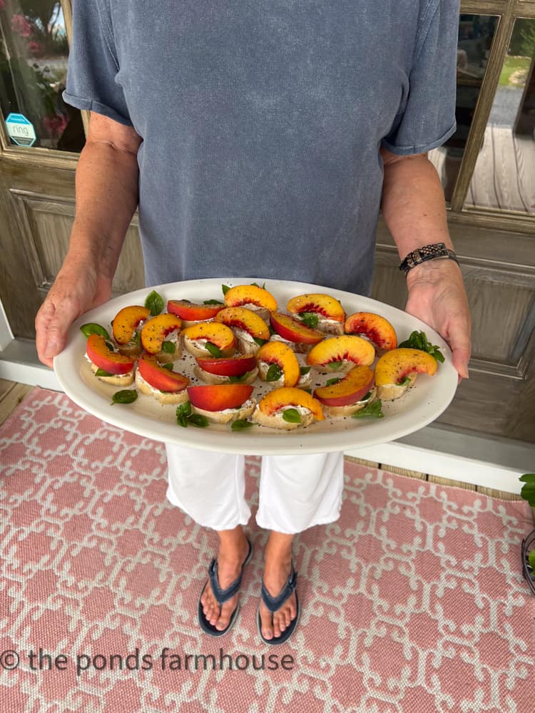 Serve Peach bruschetta on a large serving tray.  