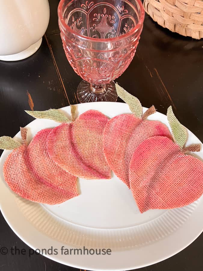 DIY Drink Coaster that are shaped like peaches made from burlap hostess gift ideas to protect tables from water rings.