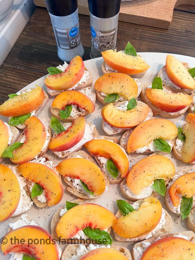 Peach Appetizer with a touch of salt and pepper before adding the balsamic glaze to the peaches