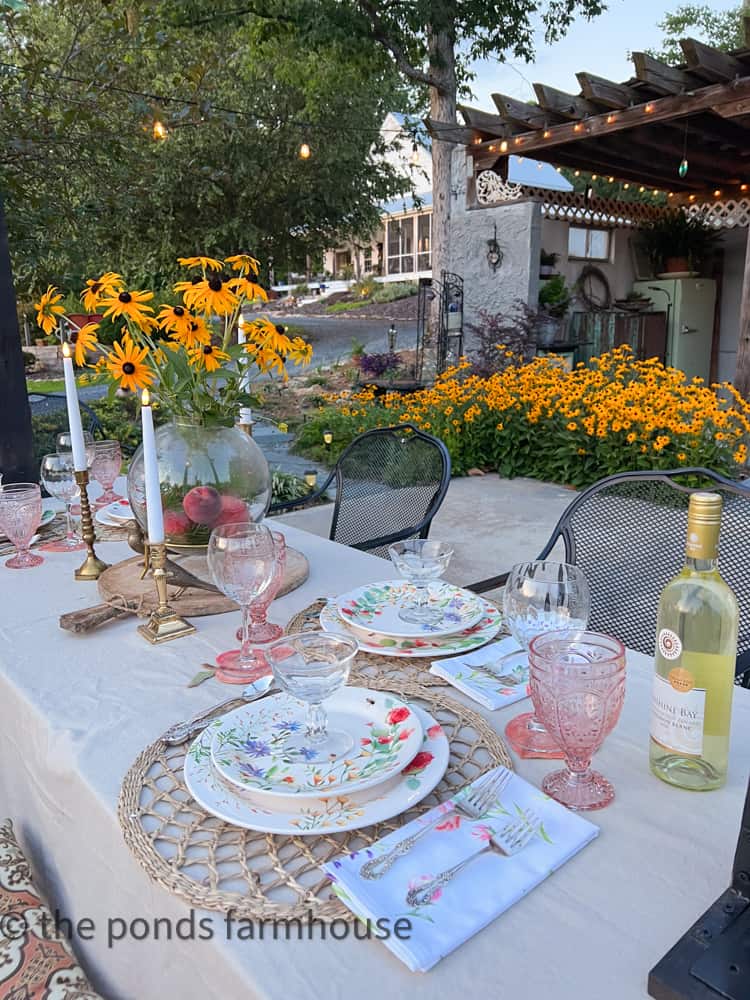 Everything Peachy Keen Supper Club Summer Tablescape Dinner Party.  With a peach and flower centerpiece.