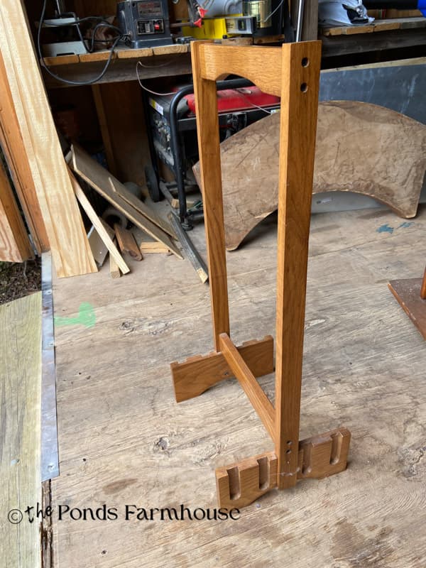 thrift store frame used to make a DIY cornhole scoreboard