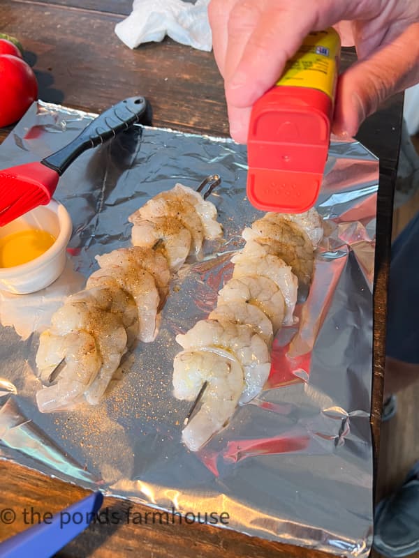 add old bay seasoning to the shrimp before grilling.  