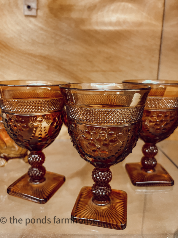 Amber water goblets at thrift store.