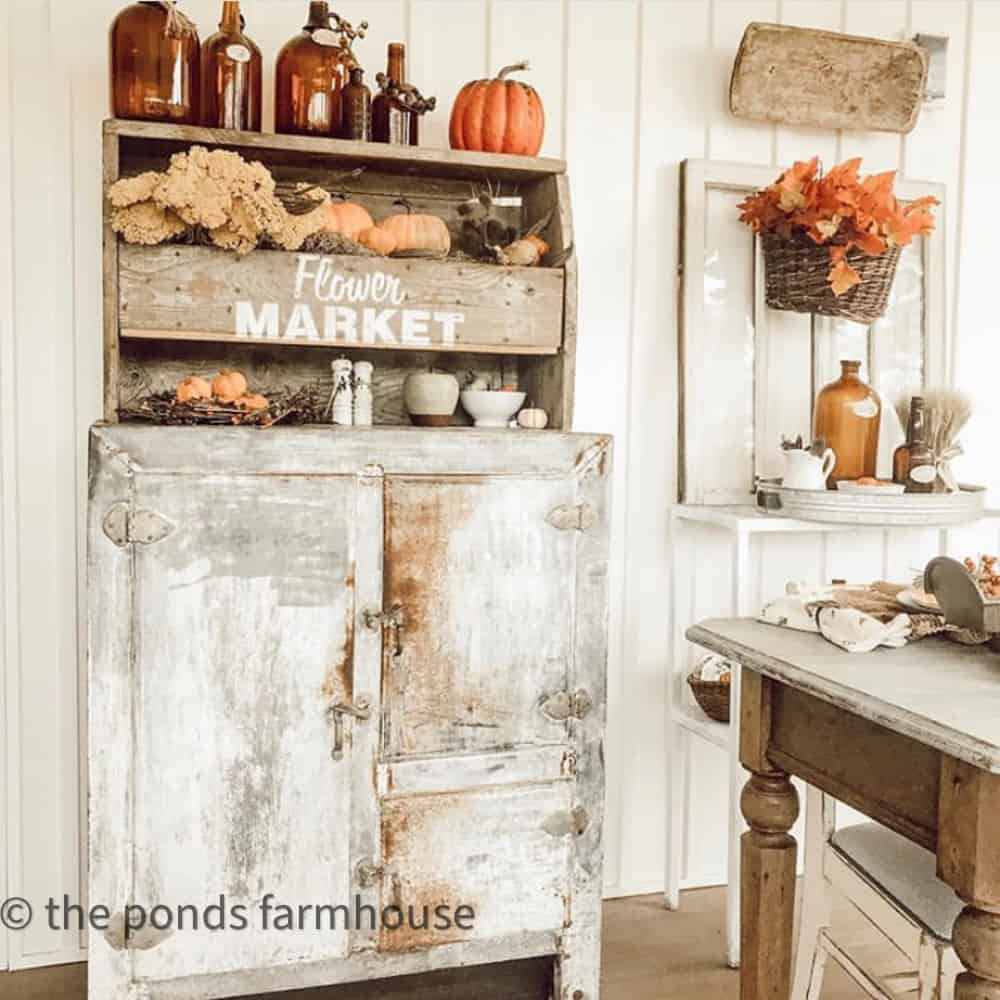 Rustic Fall Decorating with Vintage  colored Glass bottles and Jars and pumpkins