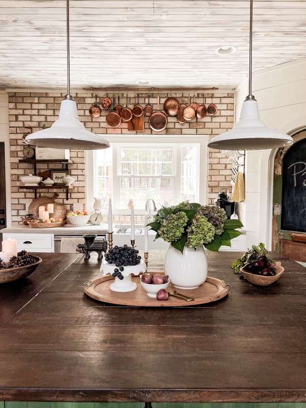 DIY KItchen Island centerpiece for budget kitchen decorating ideas with ironstone vase and hydrangeas.