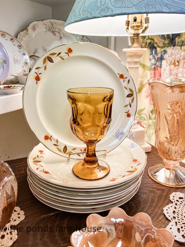 11 Best Trending Home Decor Ideas To Thrift For This Fall.  Leaf plates and amber glasses.