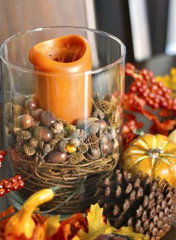 Inspiration fall glass jar with candle and acorns.  
