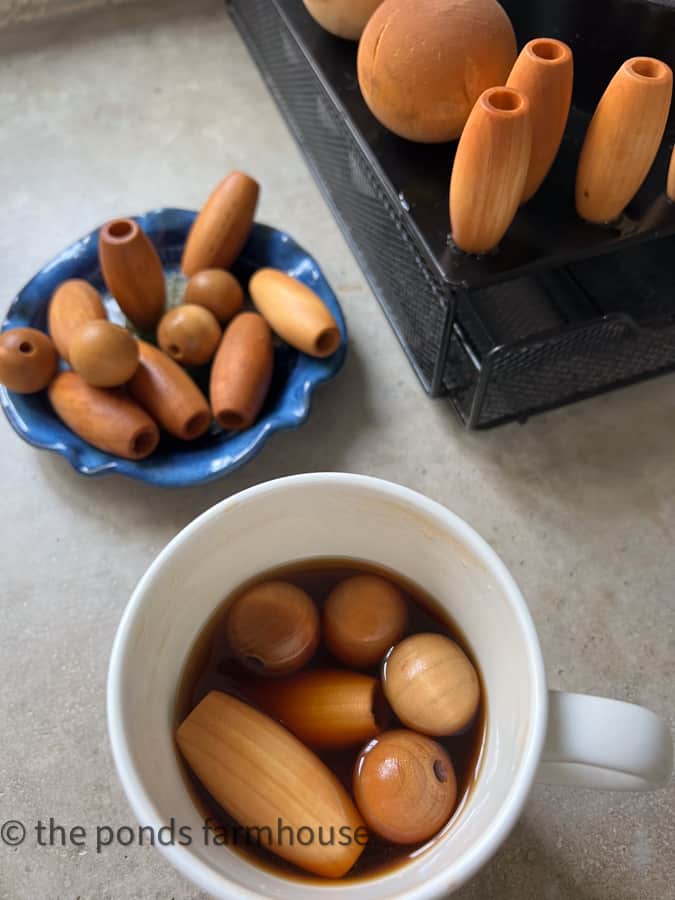 soak wooden beads in coffee to stain them.  