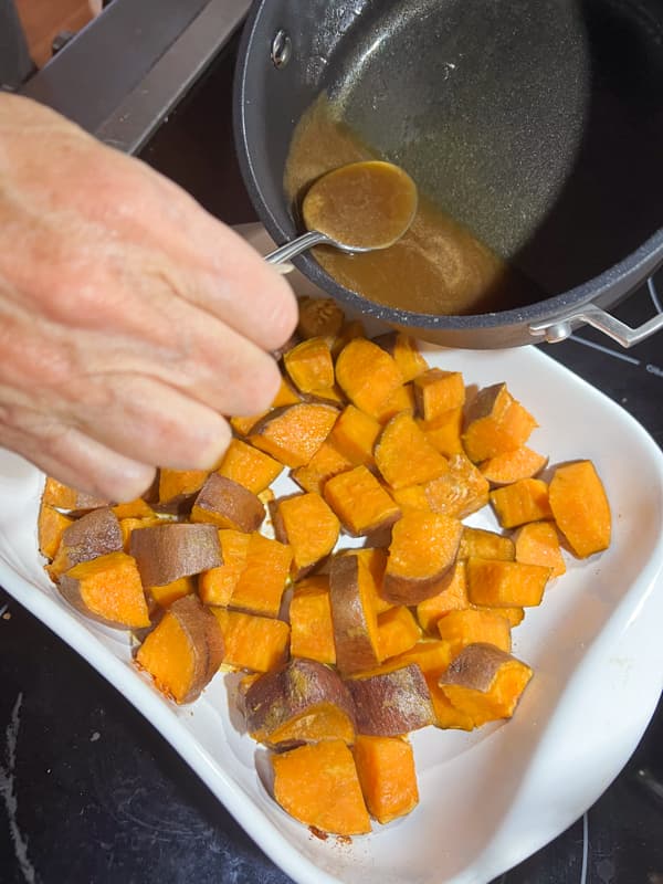 Spoon homemade caramel sauce over the potato bake