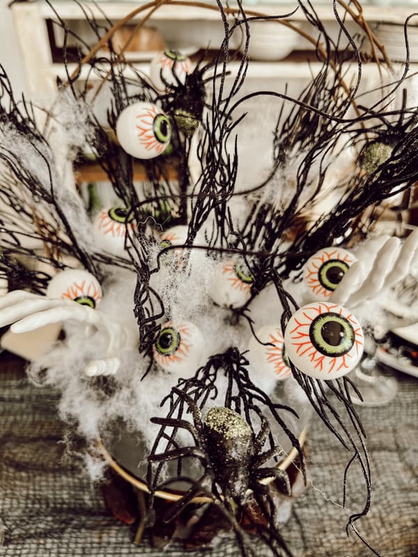 Spooky Eyes and Spiders fill Dollar Tree DIY Centerpiece Ideas for Halloween Centerpiece