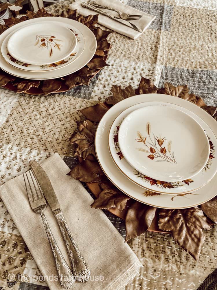 Plate chargers with DIY plaster leaves painted copper