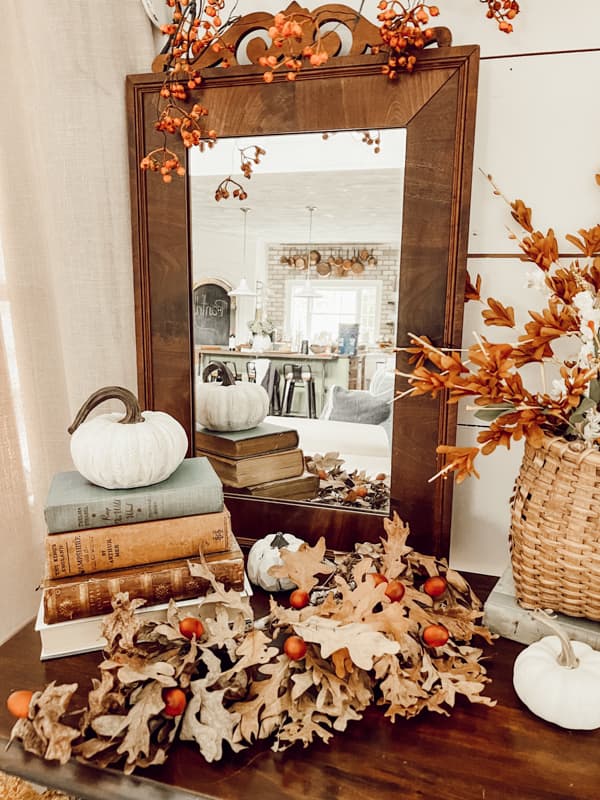 Fall Table Set-up with foraged leaves and sticks to create an autumn entryway table.  