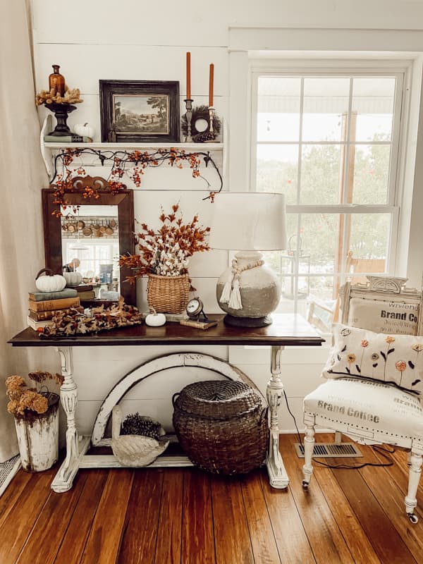 Entry Table with Vintage Vignette, DIY foraged arrangement, DIY earthenware lamp and antique mirror.