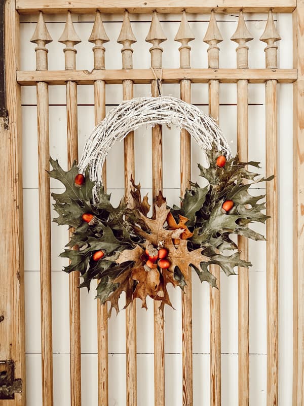 Foraged Wreath on vintage barn door inside the farmhouse