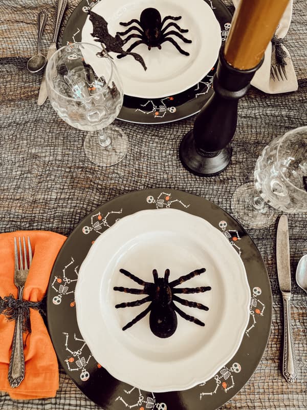 Dollar Tree Spider in plate center with spooky charger plates