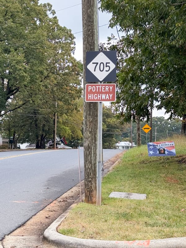 North Carolina Pottery Highway sign - the place to find handmade pottery, earthenware, and salt glaze pottery in Seagrove,NC