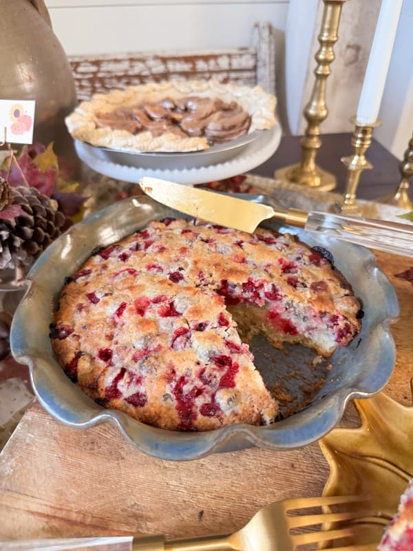 Cranberry Dump pie in flutted pottery baking dish. 