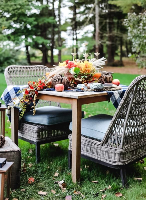 Outdoor Table Centerpiece with garden flowers in a woodland setting.