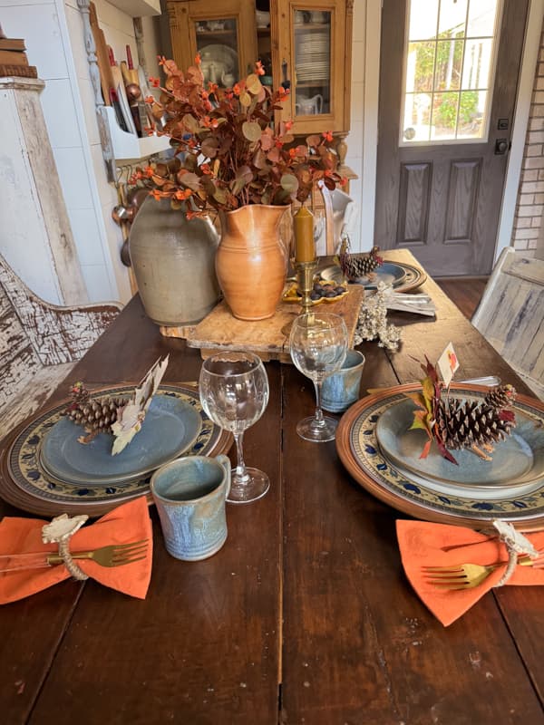 Fall Tablescape with DIY Pinecone Turkey Place Card Holders made with foraged materials. 