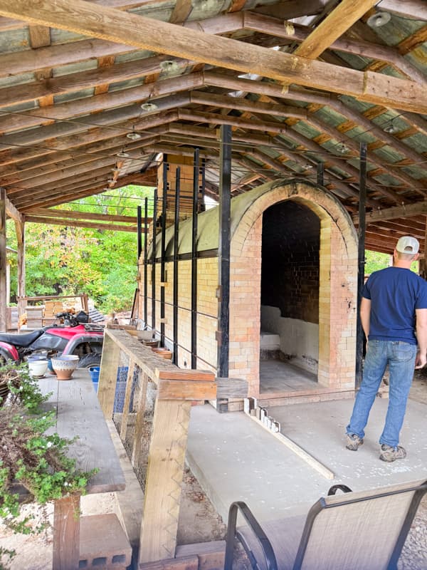 Matthew Kelly Pottery behind the scenes tour of wood fire kiln that holds 650 pottery pieces.