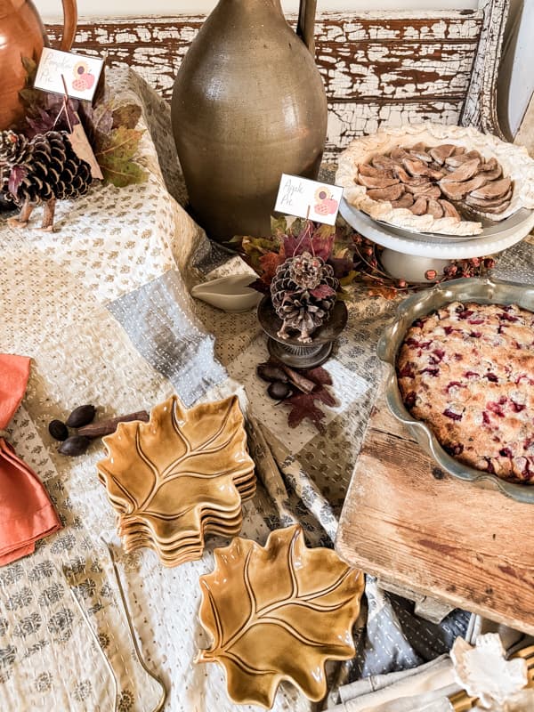 Thanksgiving buffet Pie Party Set up with DIY pinecone Turkey place card holders and leaf shaped dessert plates