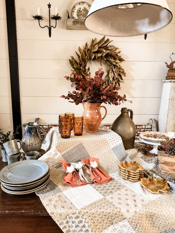 Set up for a Thanksgiving Pie Party Buffet Table with rustic tableware and DIY decor.  