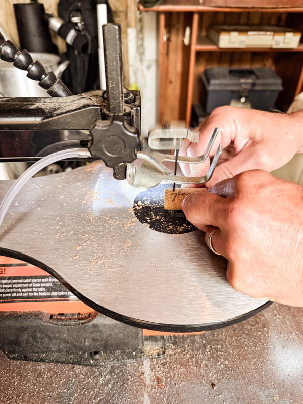 Use scroll saw to cut wine corks in half. 