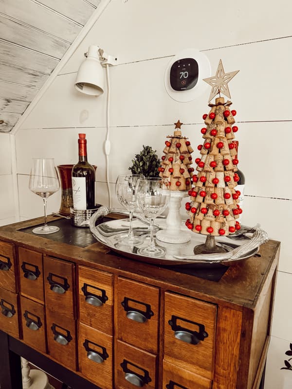 Two wine cork Christmas trees on the wine bar in the farmhouse.  