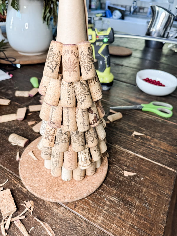 Add several rows of wine corks to make a wine cork Christmas tree.