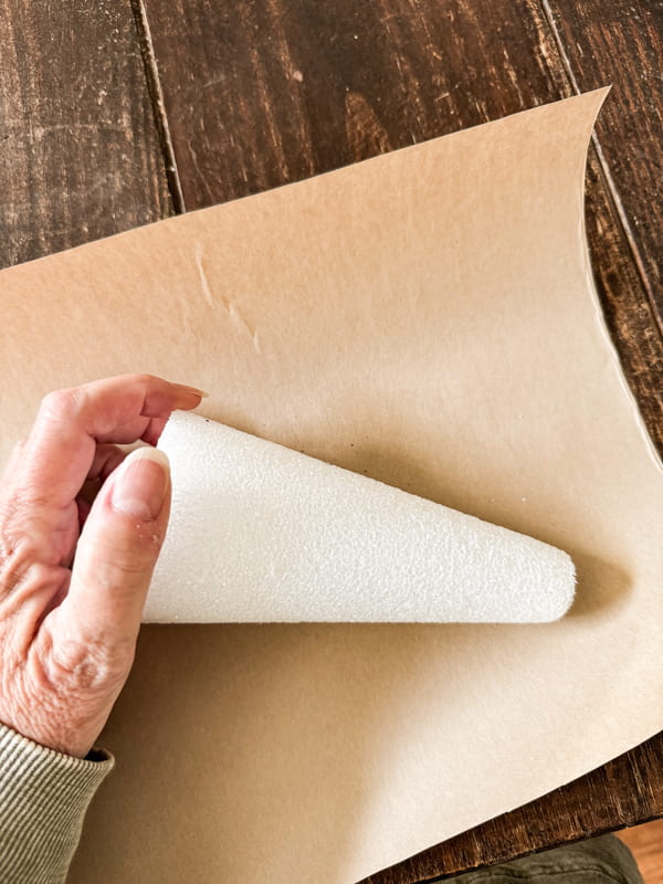 Wrap styrofoam cones with craft paper and attach with hot glue