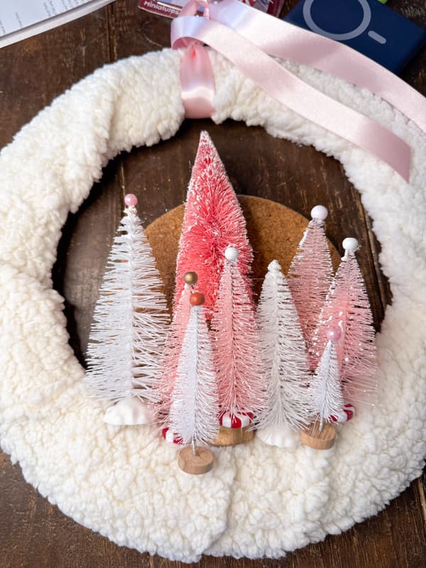 Large Pink Bottle Brush Tree Wreath from Dollar Tree materials and fleece fabric.