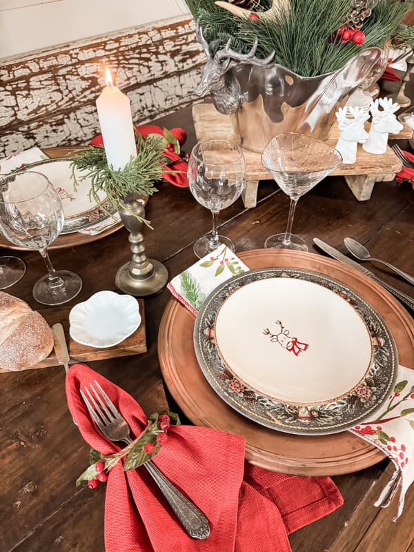 Reindeer Salad Plates for place setting on a cozy cabin Christmas Table Setting with holly berry napkin rings